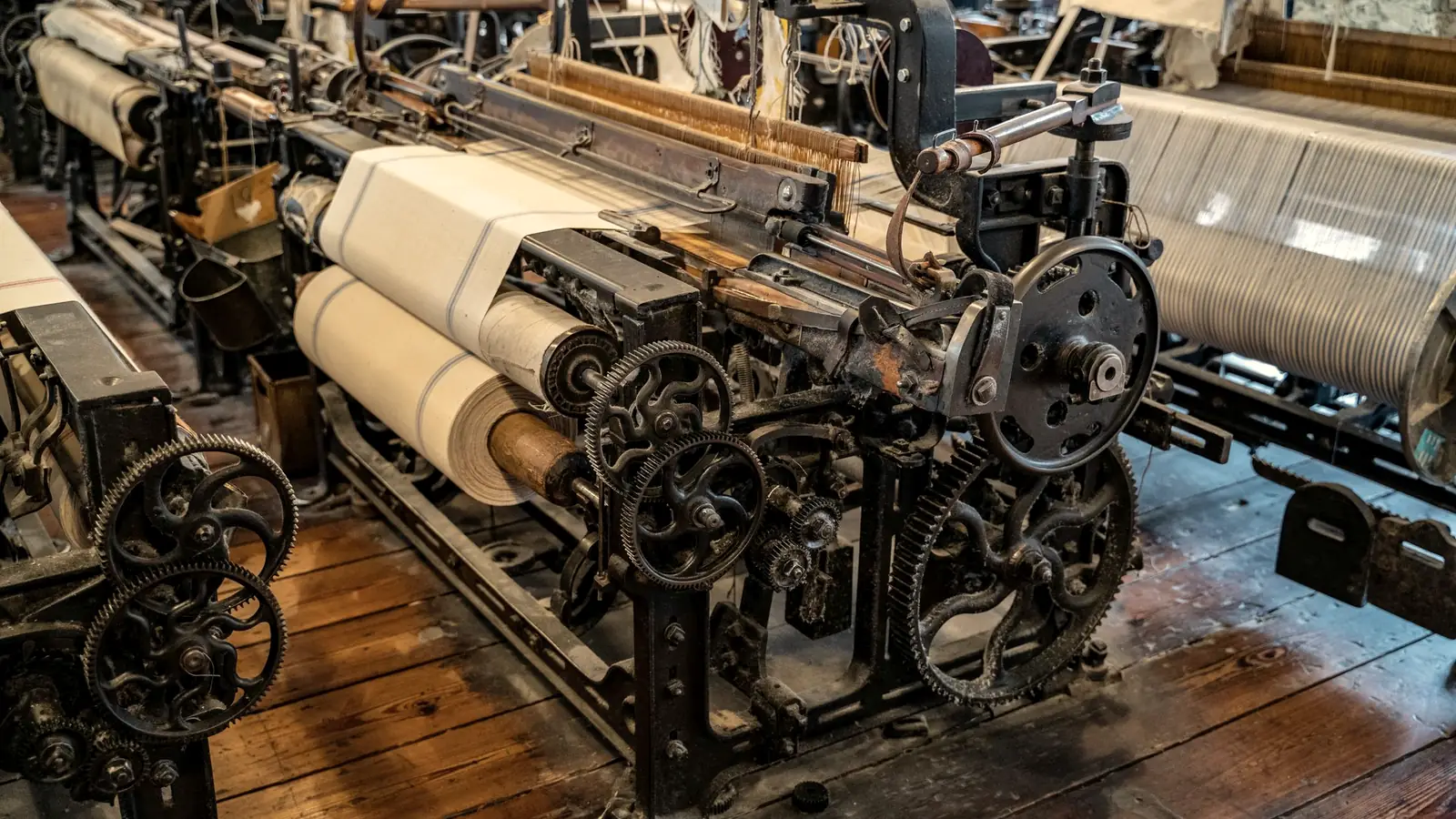 An old production machine with gears and belts