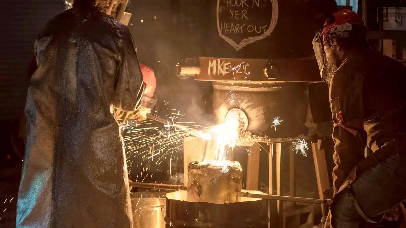 Welding in a workshop, sparks flying
